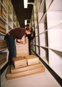 Moving archives onto the shelves at the new Borthwick, 2004